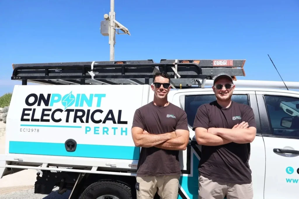 On Point Electrical Perth electricians standing beside a service vehicle